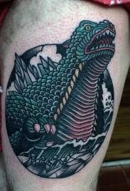Patrón de tatuaxe de Godzilla pintado en coxa