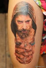 Hårtørk mannlig portrett og tatoveringsmønster i lårfarge