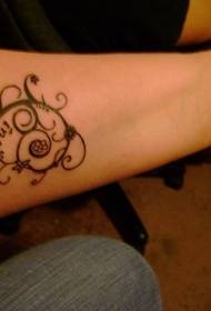 Ang sumbanan sa itom nga curling image tattoo