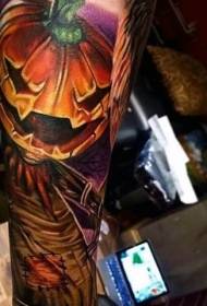 Braccio nuovo corvo colorato stile con motivo tatuaggio zucca