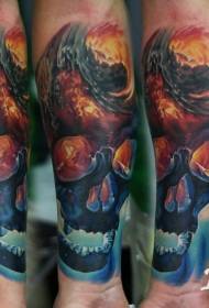 Arm modern style colored burning skull tattoo