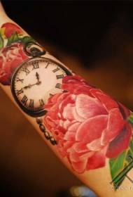 Arm mooi gekleurde bloem met klok tattoo patroon