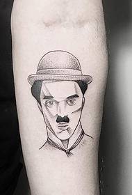 แขนสักเล็ก Chaplin ลายสักลายแถว