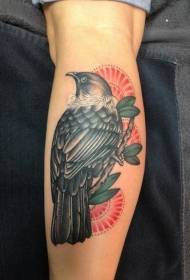 tatuaxe de paxaro colorido becerro na rama