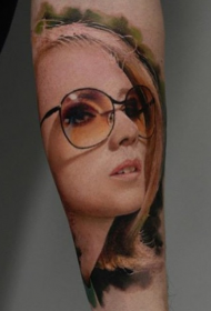 Arm color realistic woman portrait tattoo pattern