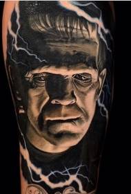 Colored frankenstein monster tattoo in arm realistic style