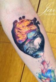 Braccio cuore colorato stile new school con tatuaggio foresta
