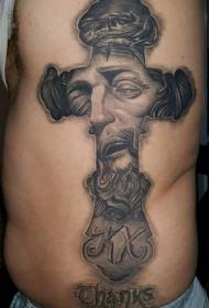 bočno rebro crno sivi križ s Isusovim uzorkom portreta tetovaža