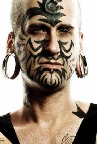 Teste padrão tribal preto do tatuagem da cara do totem