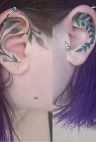 Posadite uho za djevojčicu tetovažu na slici crne biljne tetovaže