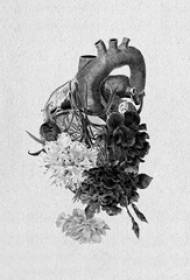 isiklikud mustad torgatud loomelillede lilled ja südame tätoveeringu käsikiri