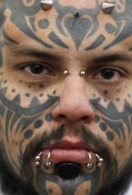 мужское лицо черная вода маори стиль тотем тату