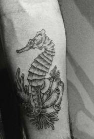 Ippocampo nero alla caviglia con motivo tatuaggio corallo