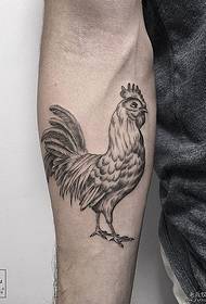 Aarm mat engem schwaarze groe Cock Tattoo Muster