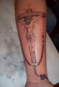 Klenge Aarm reliéise Jesus um Kräiz mat engem rosareschen Tattoo Muster