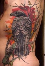 Raven kleur tatoeëringsfoto op 'e taille sydtak
