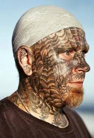 Цялото лице е модел на татуировка на паяк Net