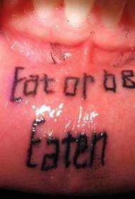 two rows of black letter tattoo patterns inside the lips