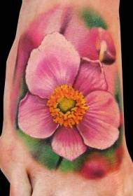腳背上美麗的粉紅色花朵紋身圖案