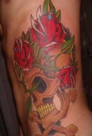teschio colorato in vita e motivo tatuaggio floreale