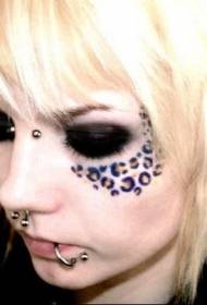 dekliški obraz leopard barvni vzorec tatoo