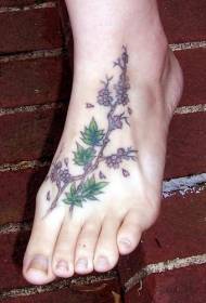 female instep color flower and tree tattoo pattern