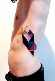 foto di tatuaggio geometrico acquerello maschio lato vita