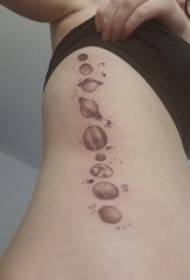 brinjët e vajzave planetare brinjë anësore në planetin tatuazh foto