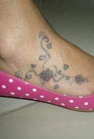 fiore del piede femminile colore modello di tatuaggio