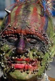 gezicht super horror piercing en kleur tattoo patroon
