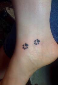 tattoo met kleine kat pootafdruk tattoo