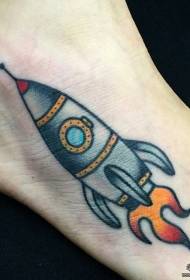 Patrón de tatuaje pintado de cohete de dibujos animados empeine
