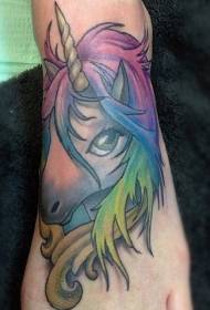 Intricat patró de tatuatges d'unicorns multicolors