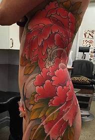 test kitett lány oldalán derék bazsarózsa virág tetoválás
