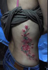 schoonheid kleine taille mooie mooie bloem tattoo foto