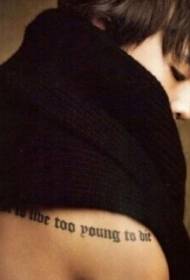 Quan Zhilong back shoulder English alphabet tattoo picture