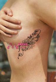 Girl side chest vanilla tattoo picture