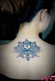 girl Lotus small totem tattoo picture on the back