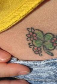 small flower and green three-leaf tattoo pattern