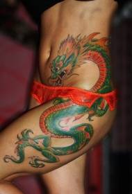 女生大腿侧肋绿色的龙纹身图案
