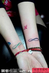 ручни пар Инфинити лого птица тетоважа узорак