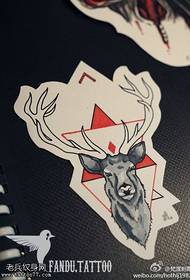 una figura di tatuatu hà ricumandatu un antilope di colore opere di manoscrittu di u tatuatu