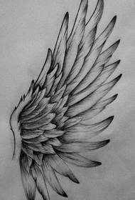 Zdjęcie pokazu tatuażu poleca zdjęcie rękopisu tatuażu skrzydła