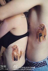 Couple of Little Yellow Dog Tattoos