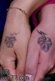 hand back couple clover tattoo pattern