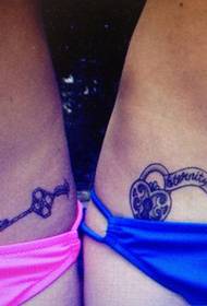 couples waist beautiful key and lock tattoo