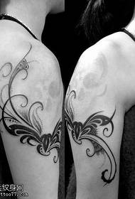 arm phoenix totem paar tatoeëringpatroon