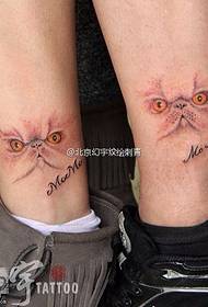 Cat tattoo on the ankle of the couple