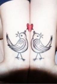 coppia uccelli amano u tatuaggio