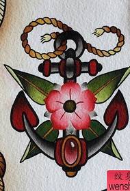 un modello di manoscritto tatuaggio fiore di ancoraggio